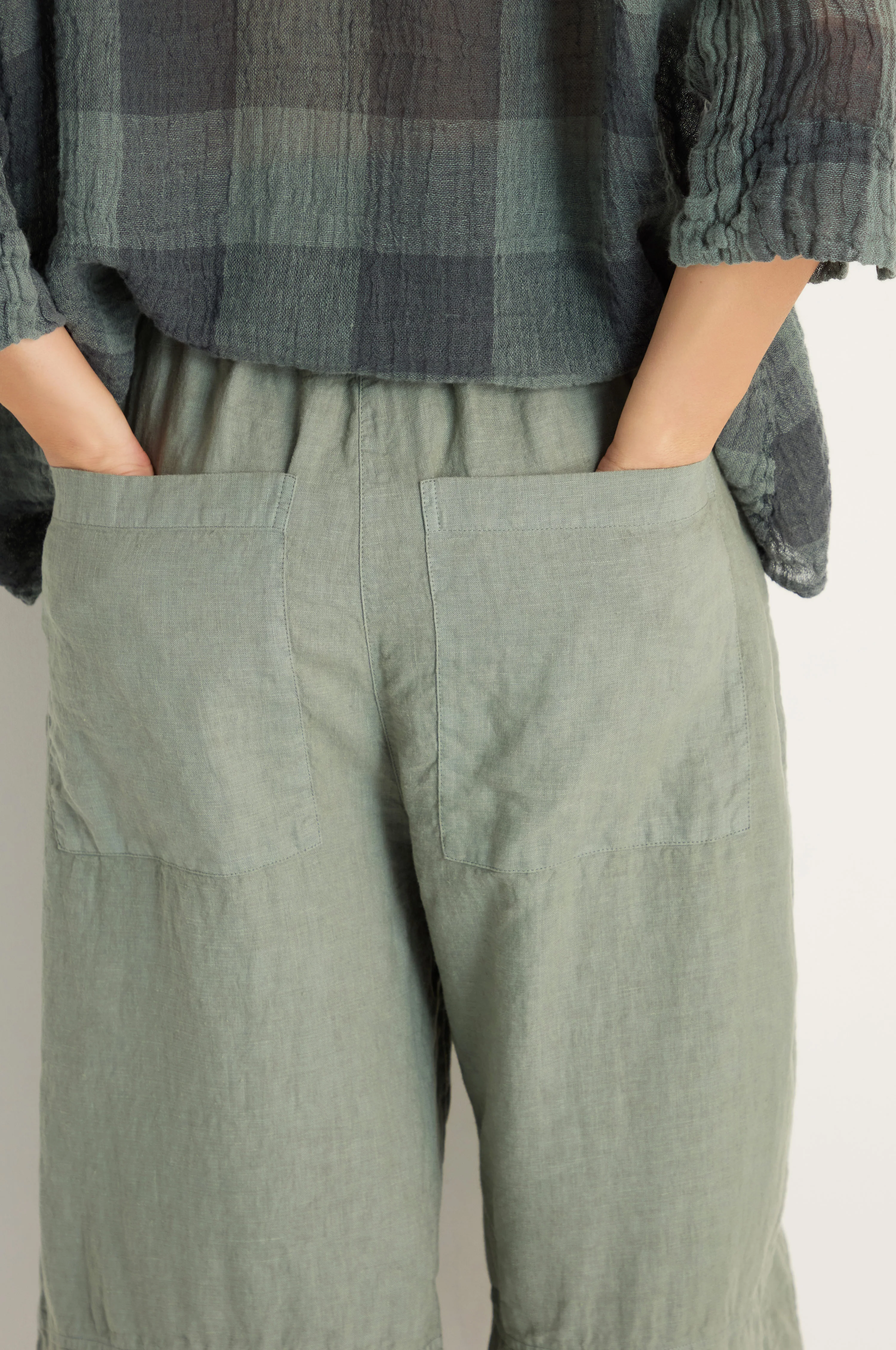 Curved Seam Linen Trousers - Image 11